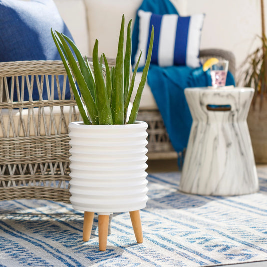 Orchid - 29030 by Surya in white and mattenatural. Made from ceramic, wood in a modern style.