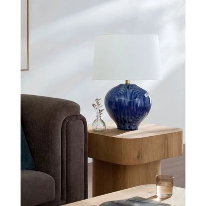 Otaki Accent Table Lamp by Surya in white, translucent, metallic gold, navy. Made from ceramic, linen, polyester, iron in a modern style.