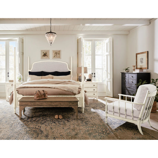 Americana California King Upholstered Poster Bed by Hooker Furniture in beige and worn white. Made from oak veneers and fabric in a traditional style.