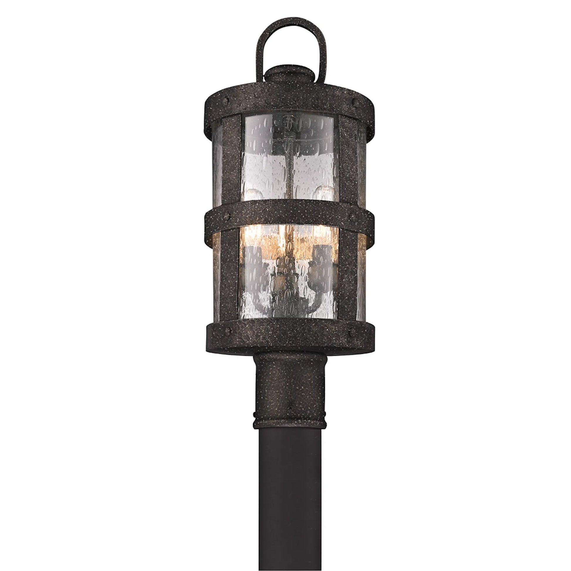 Barbosa Post Lantern by Troy in barbosa bronze. Made from hand-worked iron in a rustic style.