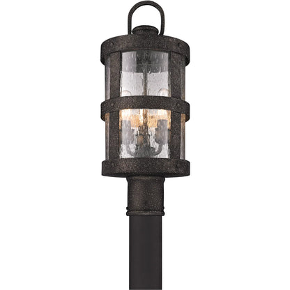 Barbosa Post Lantern by Troy in barbosa bronze. Made from hand-worked iron in a rustic style.