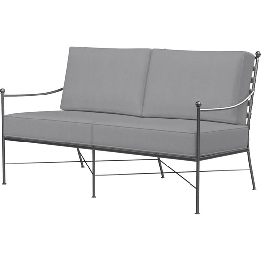 Provence Outdoor Loveseat by Sunset West. Made from wrought iron in a modern style.