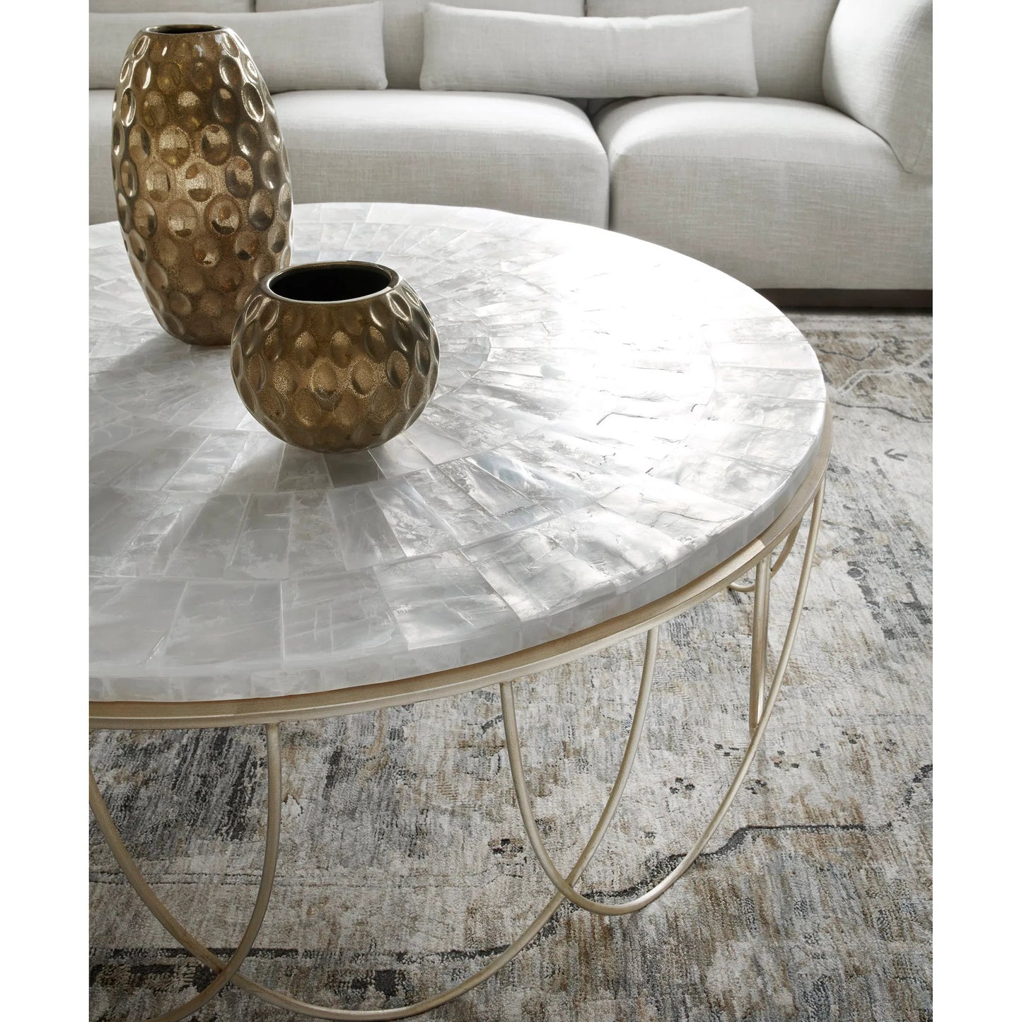 003 SI-2238766 | Closeup | Round Stone Top Cocktail Table with Decorative Metal Base by Pulaski Furniture in gold. Made from stone in a modern style.