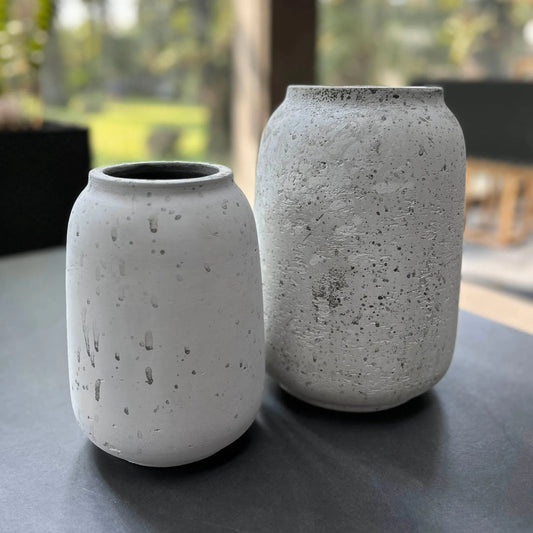 Taxco Vase by LH Imports in antique white. Made from antique white ro-cement in a unique style.