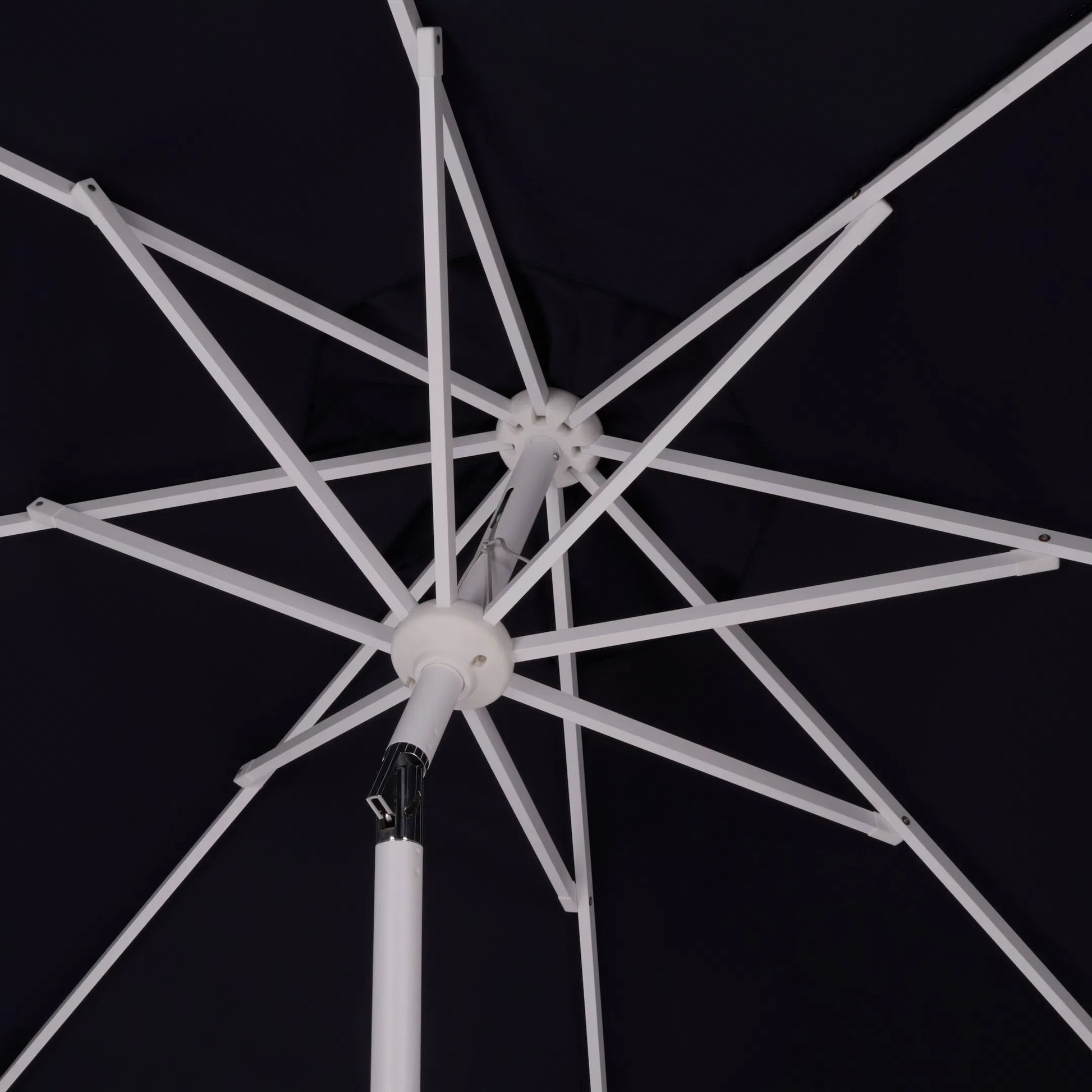 Tinian Crank Umbrella by HedgeApple Essentials. Made from aluminum, 100% polyester in a transitional style.