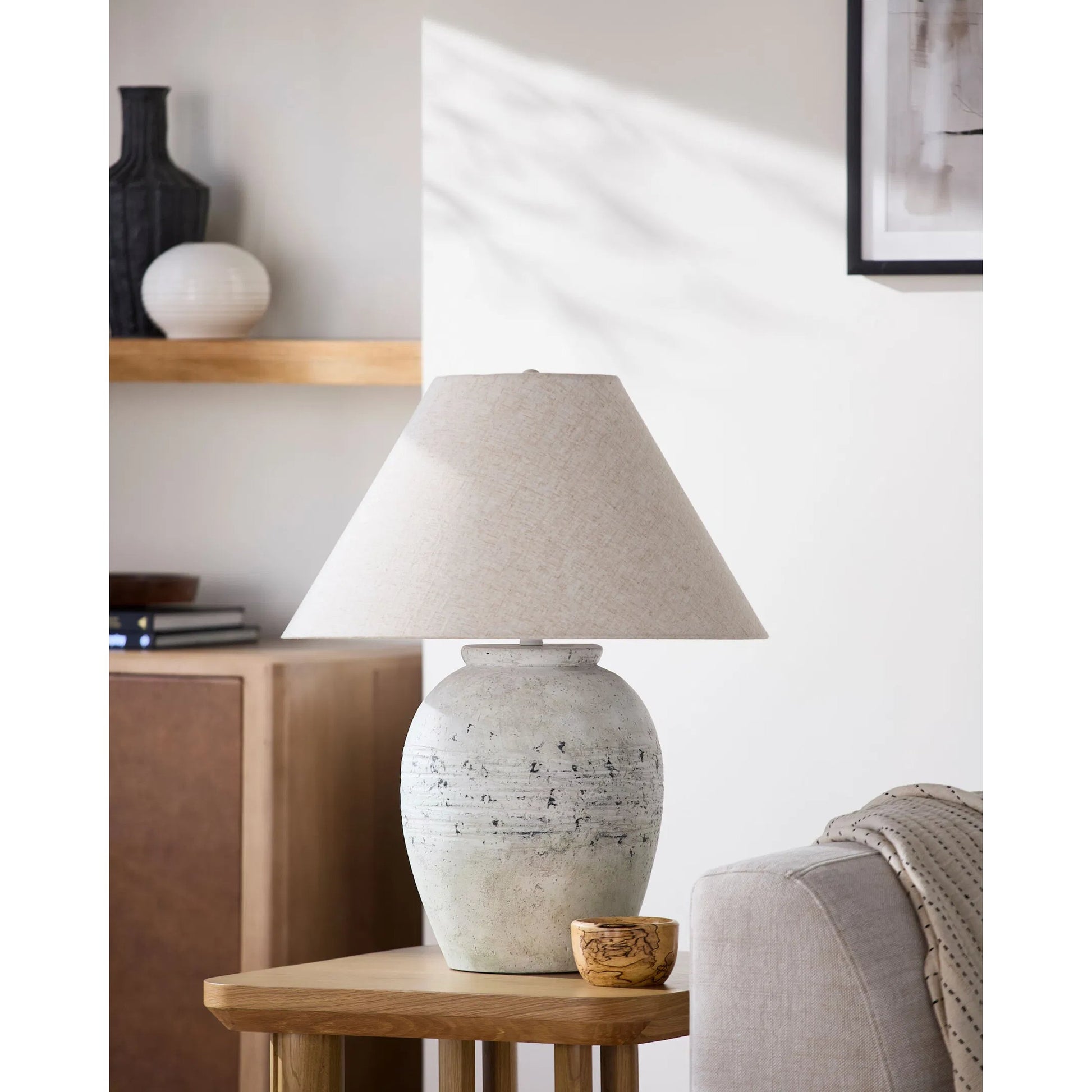 Padula Accent Table Lamp by Surya in wheat, translucent, white, metallic gold, metallic brass. Made from cement, linen, plastic, iron in a transitional style.