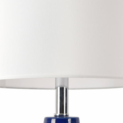 Joshua Table Lamp by Pasargad Home in white, blue. Made from metal, ceramic in a transitional style.