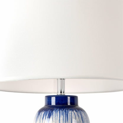 Garcia Table Lamp by Pasargad Home in white, blue. Made from metal, ceramic in a transitional style.