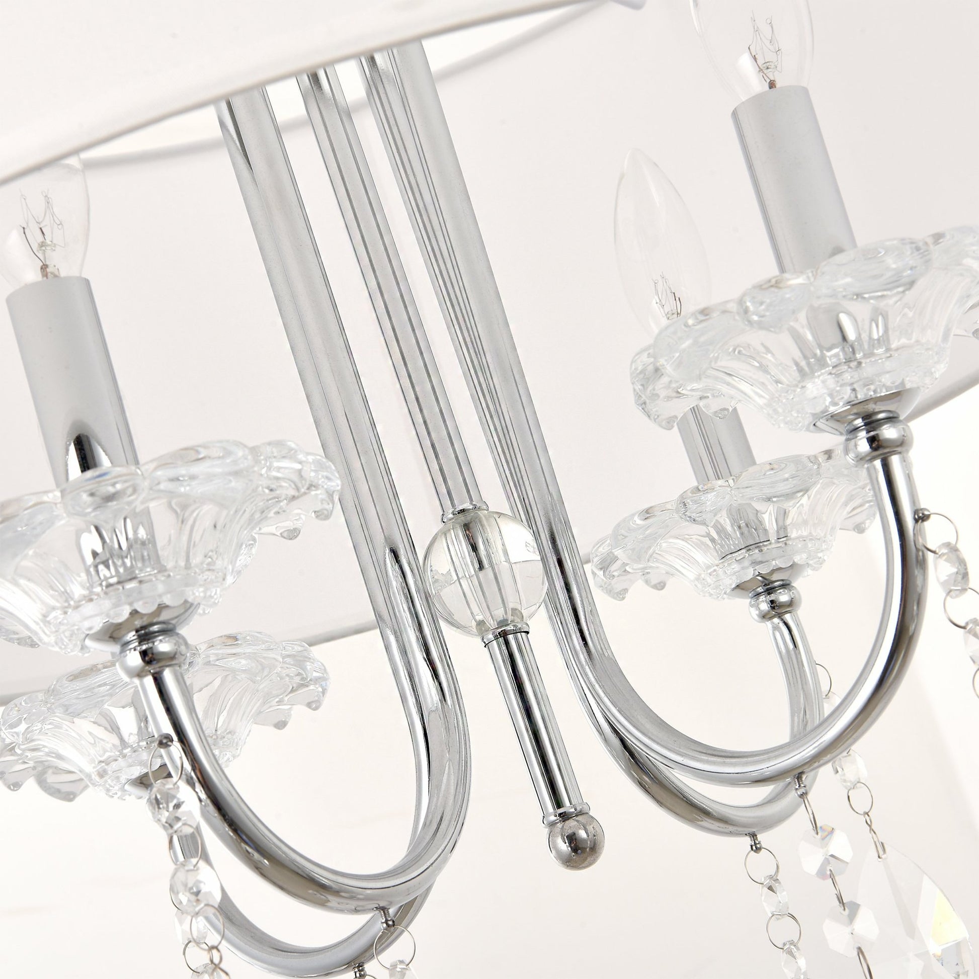 Bizet Chandelier by Pasargad Home in silver. Made from metal, cystal in a transitional style.