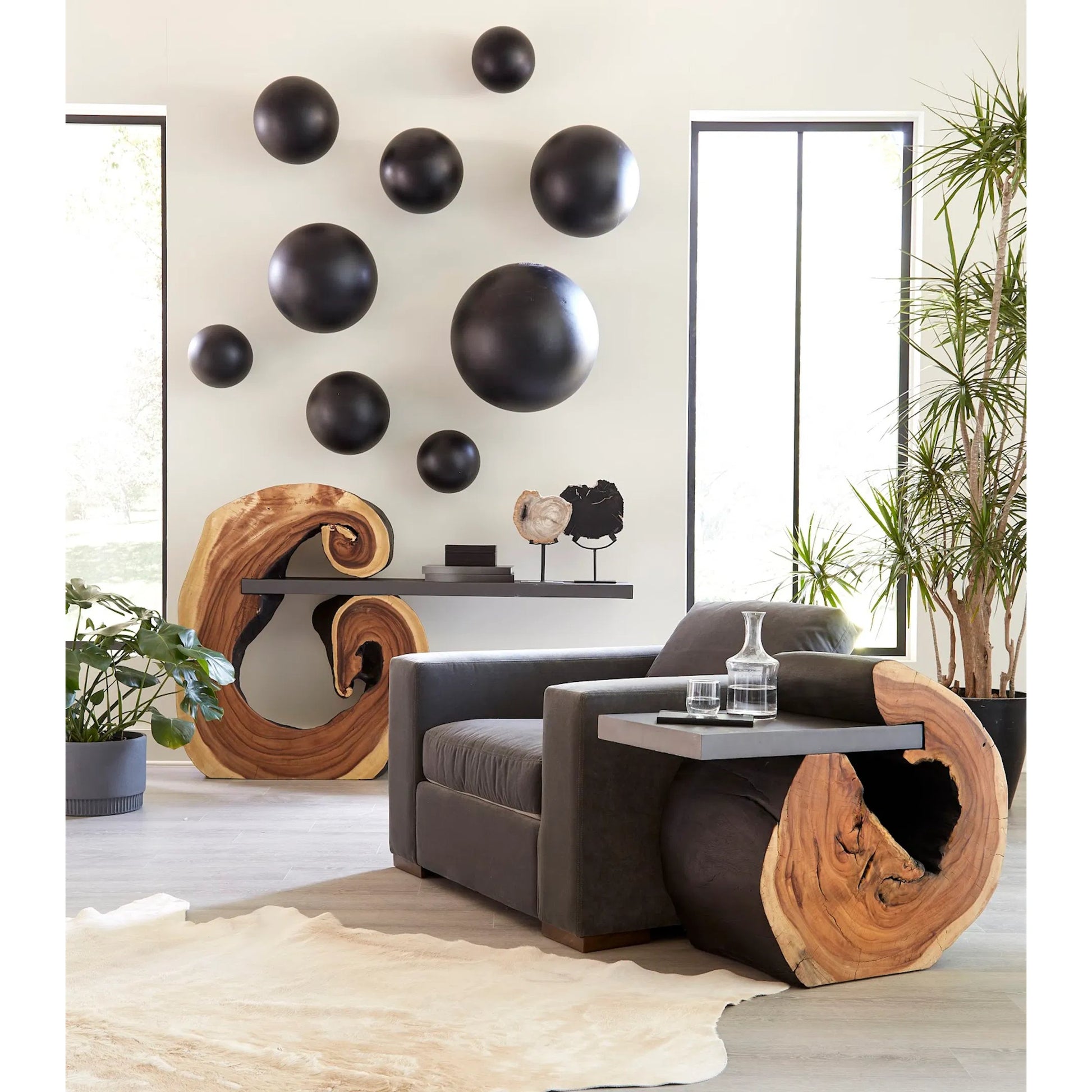 Ball on the Wall by Phillips Collection. Made from resin in a modern style.