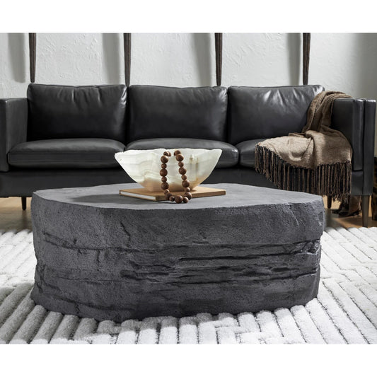 Grand Canyon Coffee Table by Phillips Collection in gray. Made from resin composite in a rustic style.