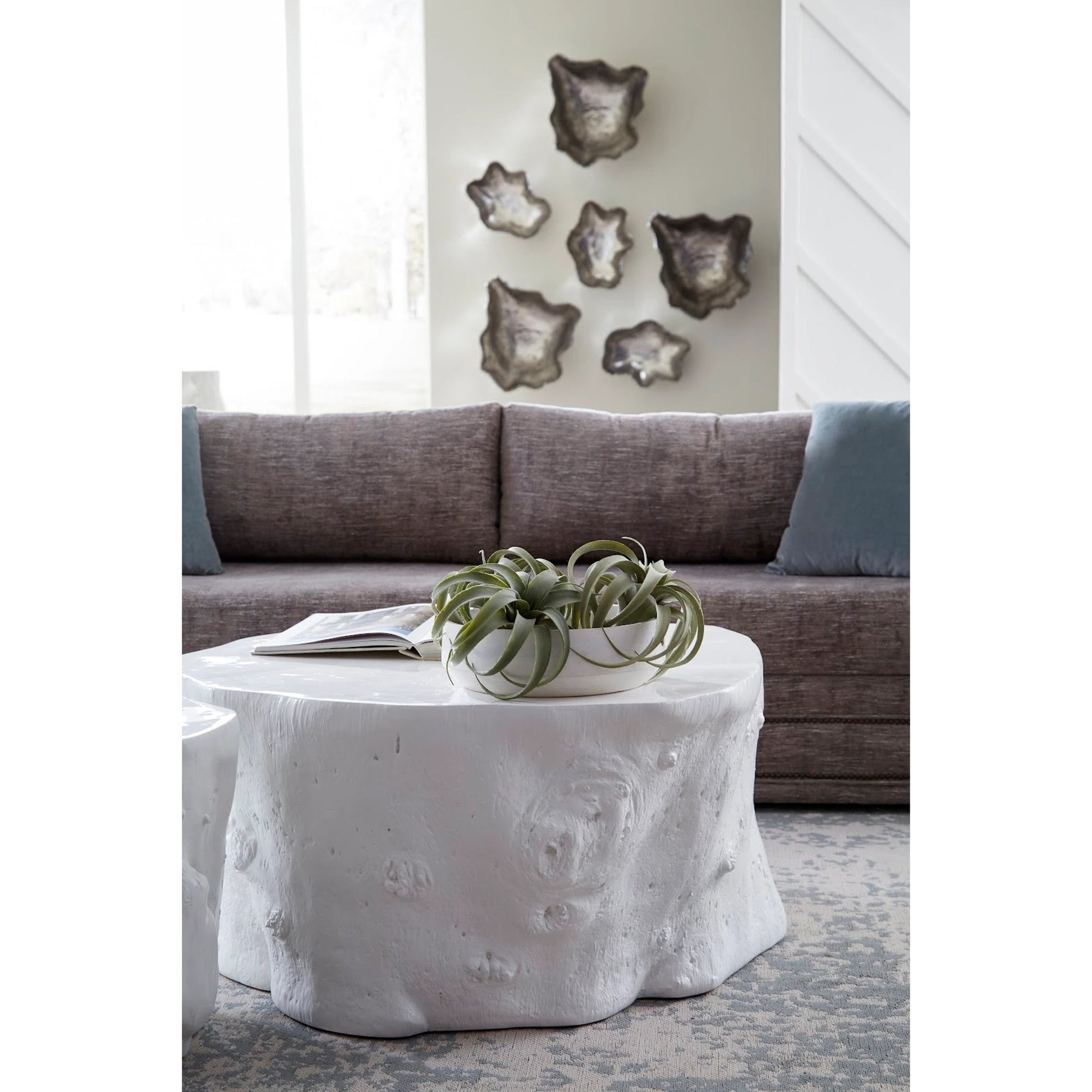Log White Coffee Table by Phillips Collection in white and white gel coat. Made from resin composite in a eclectic & global style.