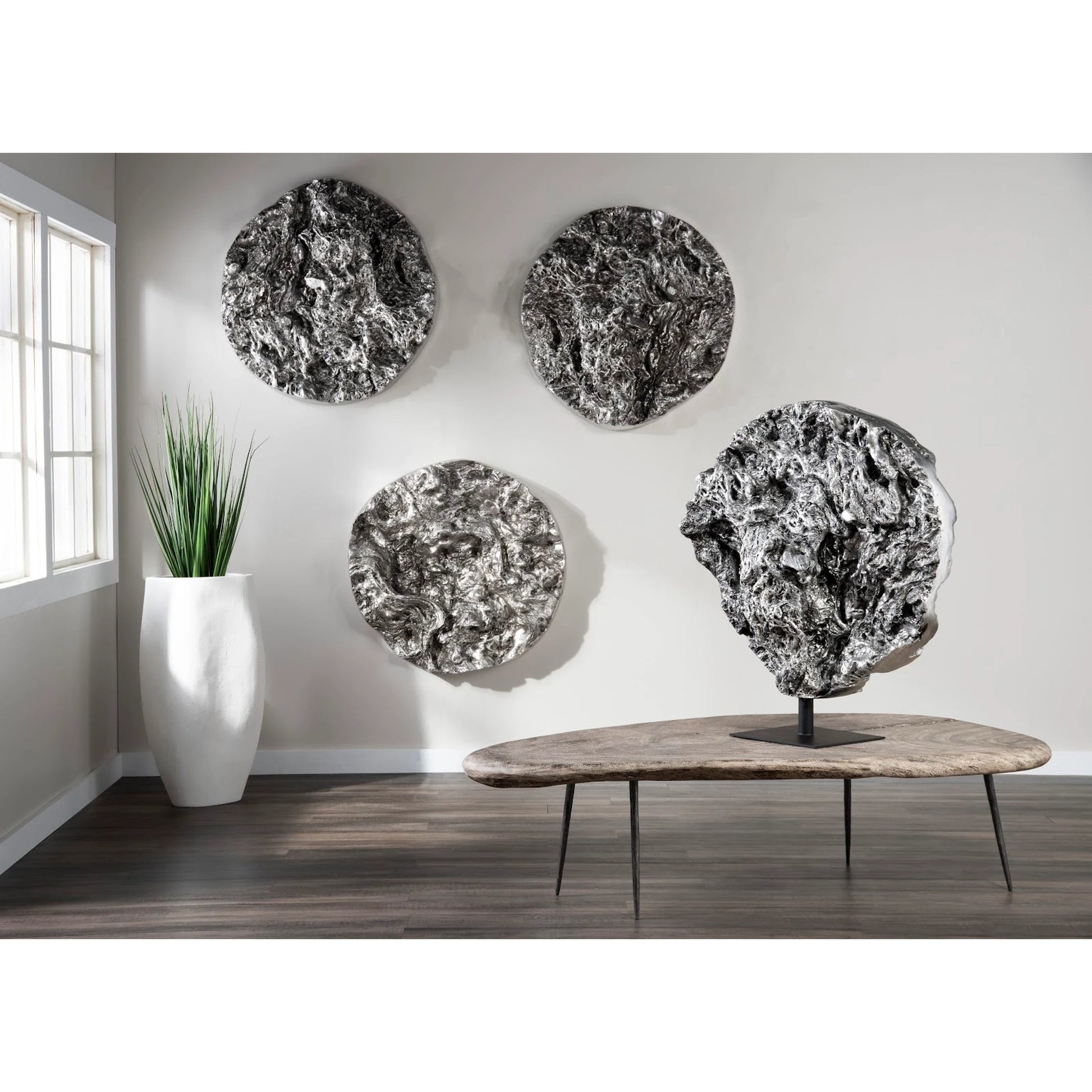 Cast Root Erupting Wall Sculpture by Phillips Collection in silver and silver leaf. Made from resin in a rustic style.