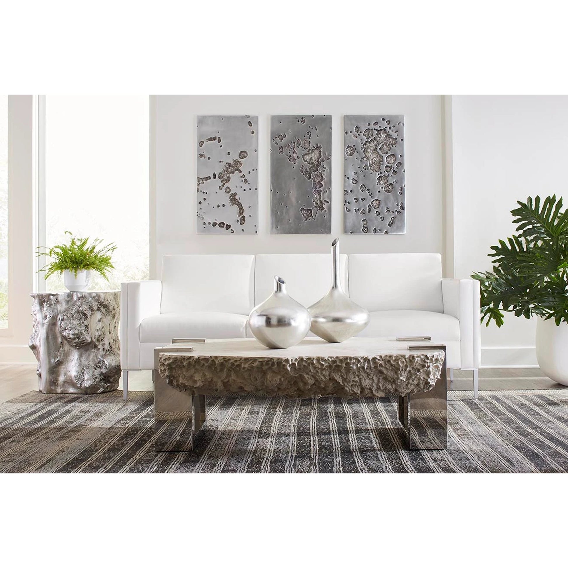Negotiation Ash Coffee Table by Phillips Collection in gray, silver and ash. Made from resin metal in a modern style.