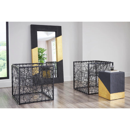 Scorched Side Table by Phillips Collection in black, gold and gold leaf. Made from resin in a modern style.