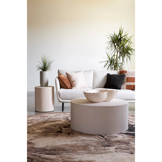 Groovy Side Table by Phillips Collection in white stone. Made from resin in a unique style.