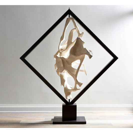 Cast Revolving Diamond Sculpture by Phillips Collection in black, white and faux bleached. Made from resin metal in a modern style.