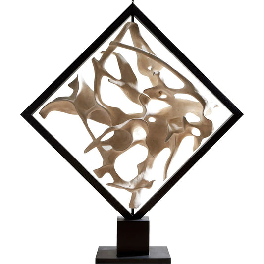 Cast Revolving Diamond Sculpture by Phillips Collection in black, white and faux bleached. Made from resin metal in a modern style.
