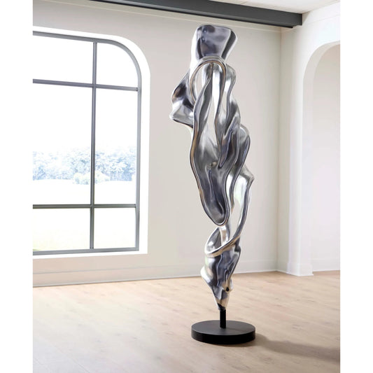Cast Dancing Sculpture Coup by Phillips Collection in silver, black and silver leaf. Made from resin metal in a unique style.