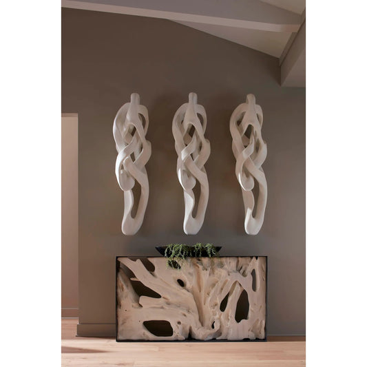 Cast Dancing Wall Sculpture Pass Faux by Phillips Collection in off white and bleached. Made from resin in a unique style.