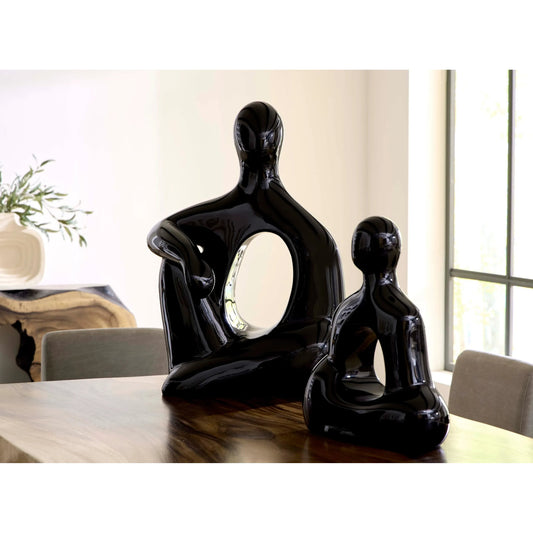 Seated Sculpture by Phillips Collection. Made from resin in a unique style.