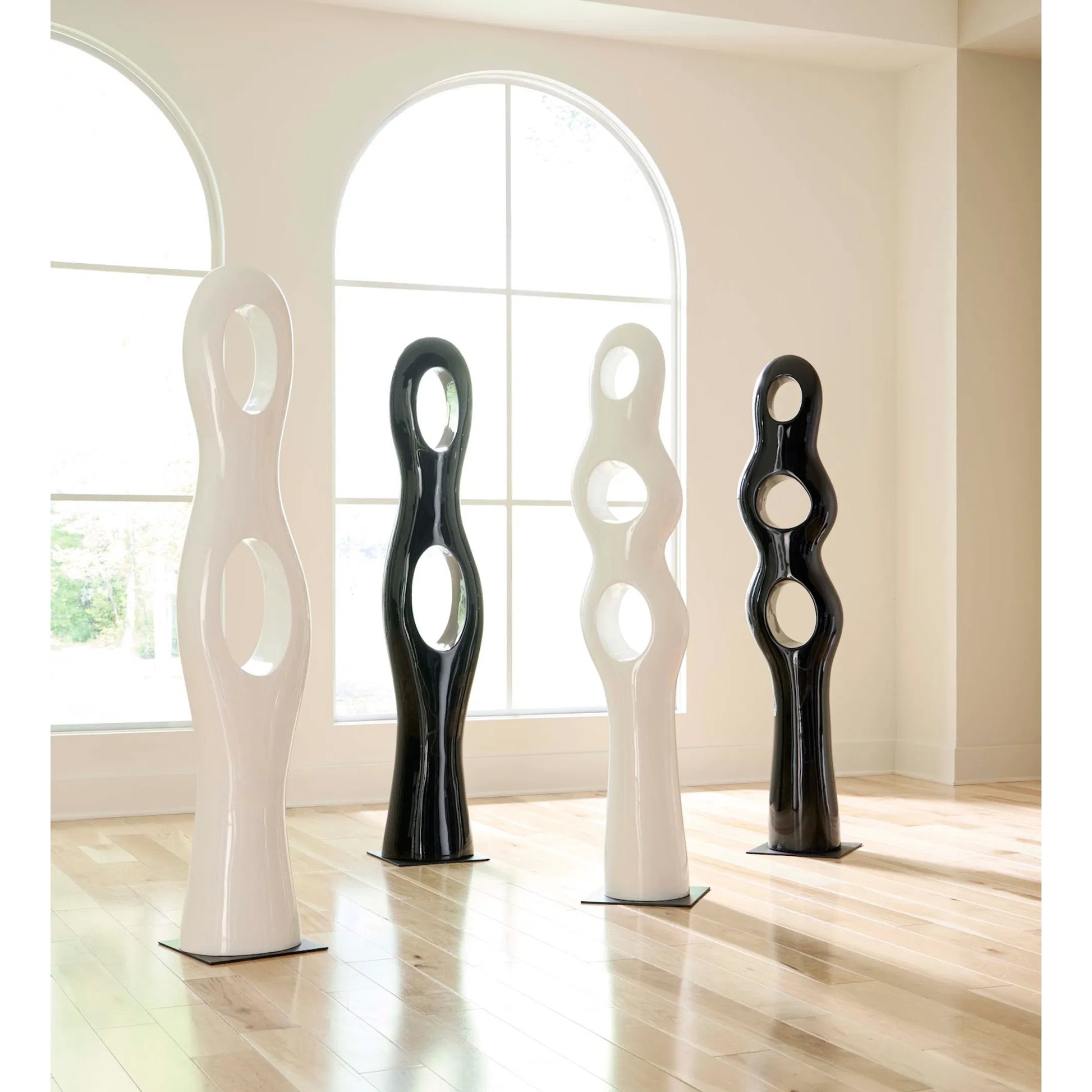 Twisted Sculpture by Phillips Collection in gel coat. Made from resin in a modern style.