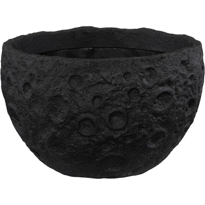 Crater Planter by Phillips Collection. Made from unique in a unique style.