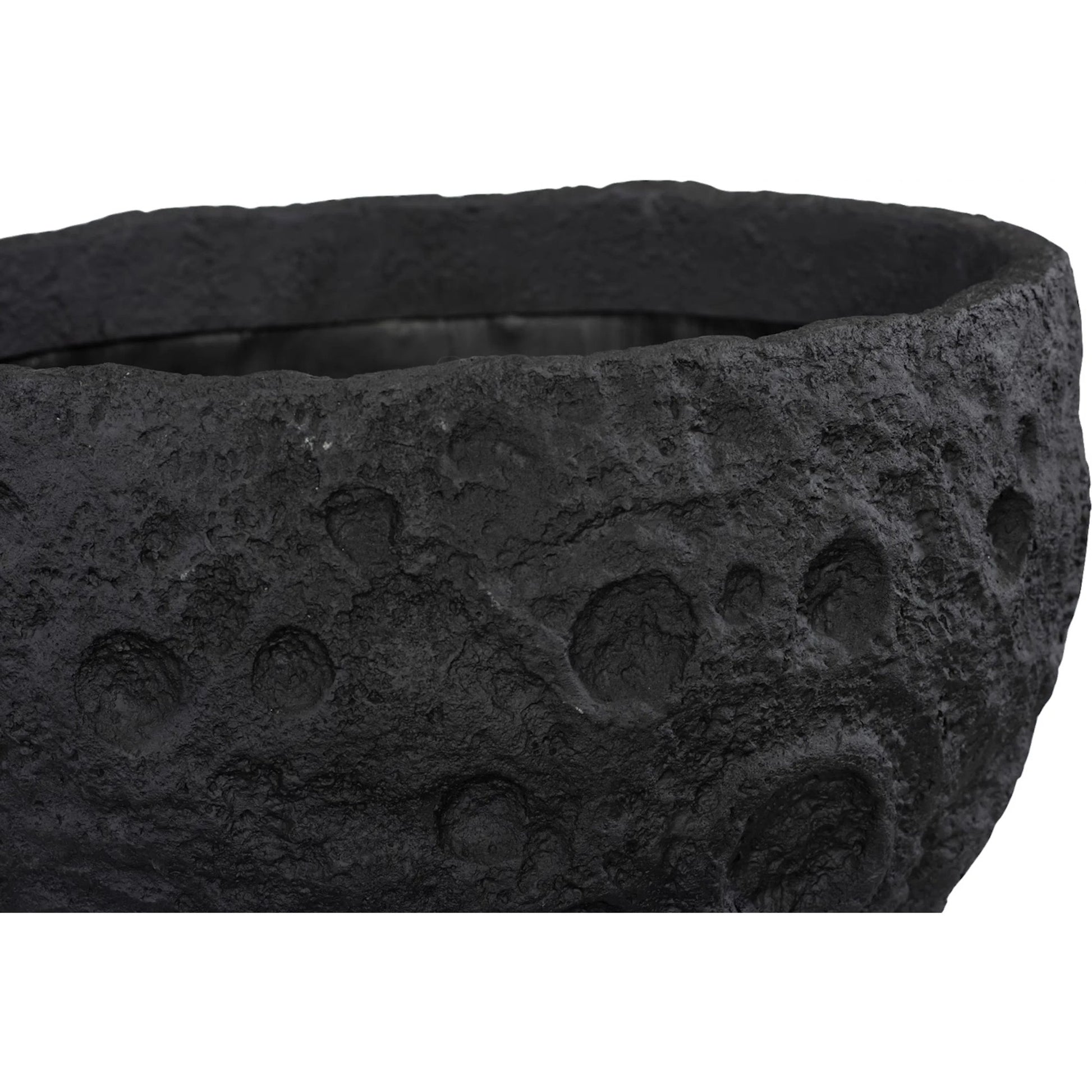 Crater Planter by Phillips Collection. Made from unique in a unique style.
