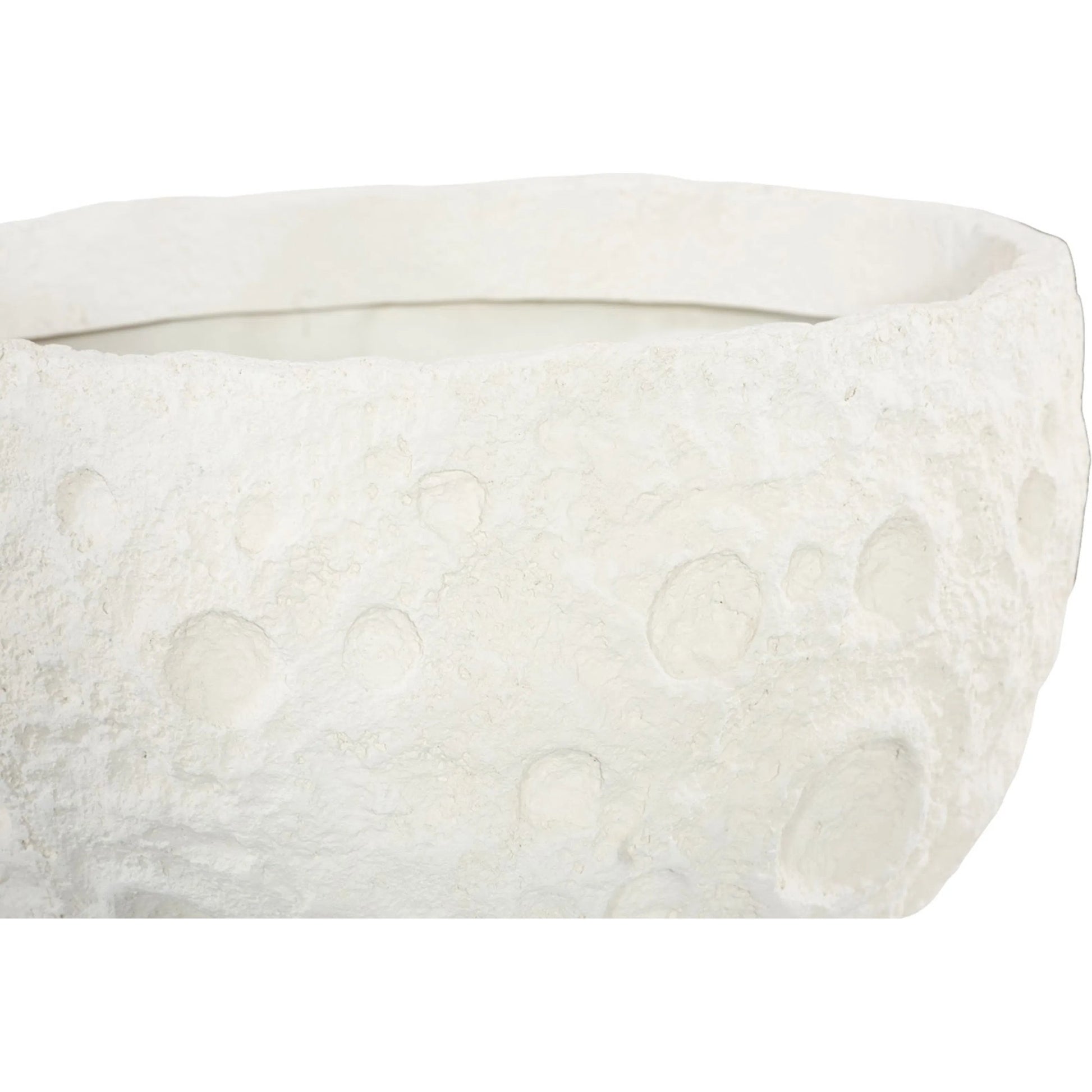 Crater Planter by Phillips Collection. Made from unique in a unique style.