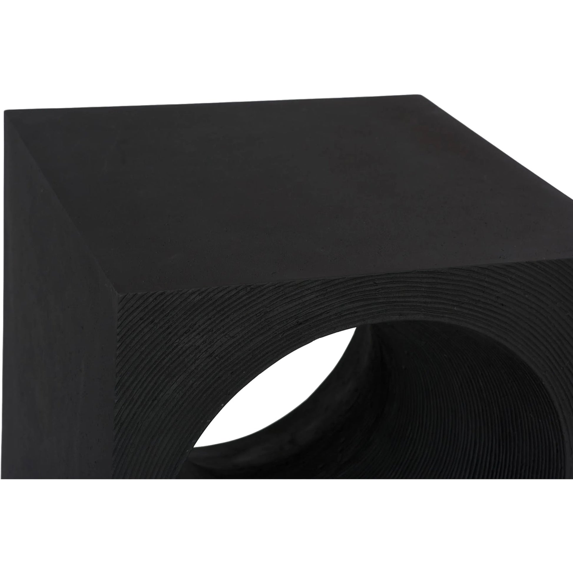Void Side Table by Phillips Collection. Made from resin, stone composite in a unique style.