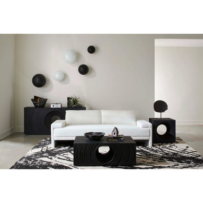 Void Side Table by Phillips Collection. Made from resin, stone composite in a unique style.