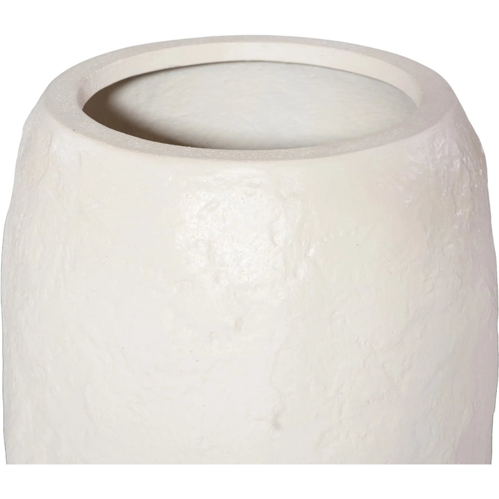 Aera Planter by Phillips Collection. Made from resin, stone composite in a unique style.