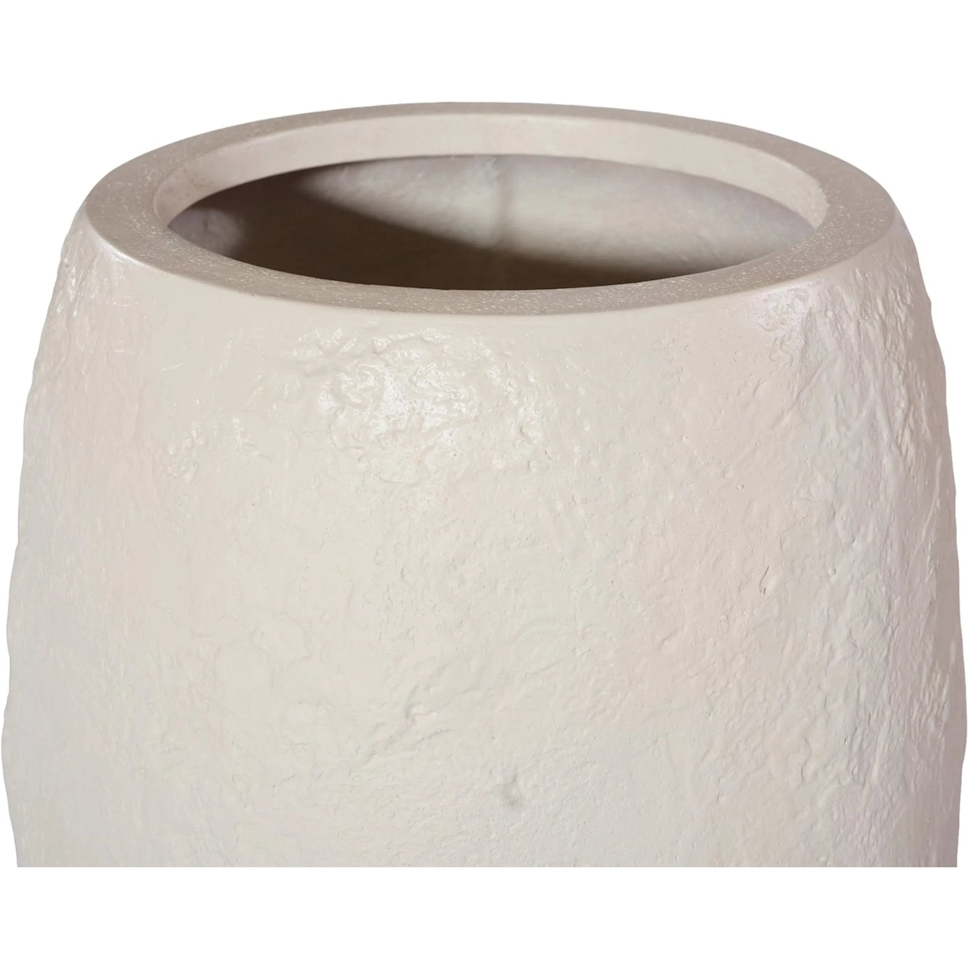 Aera Planter by Phillips Collection. Made from resin, stone composite in a unique style.
