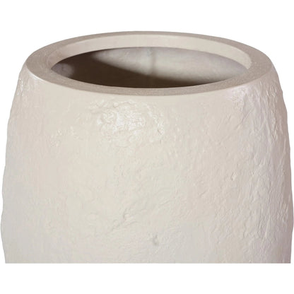 Aera Planter by Phillips Collection. Made from resin, stone composite in a unique style.