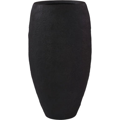 Aera Planter by Phillips Collection. Made from resin, stone composite in a unique style.