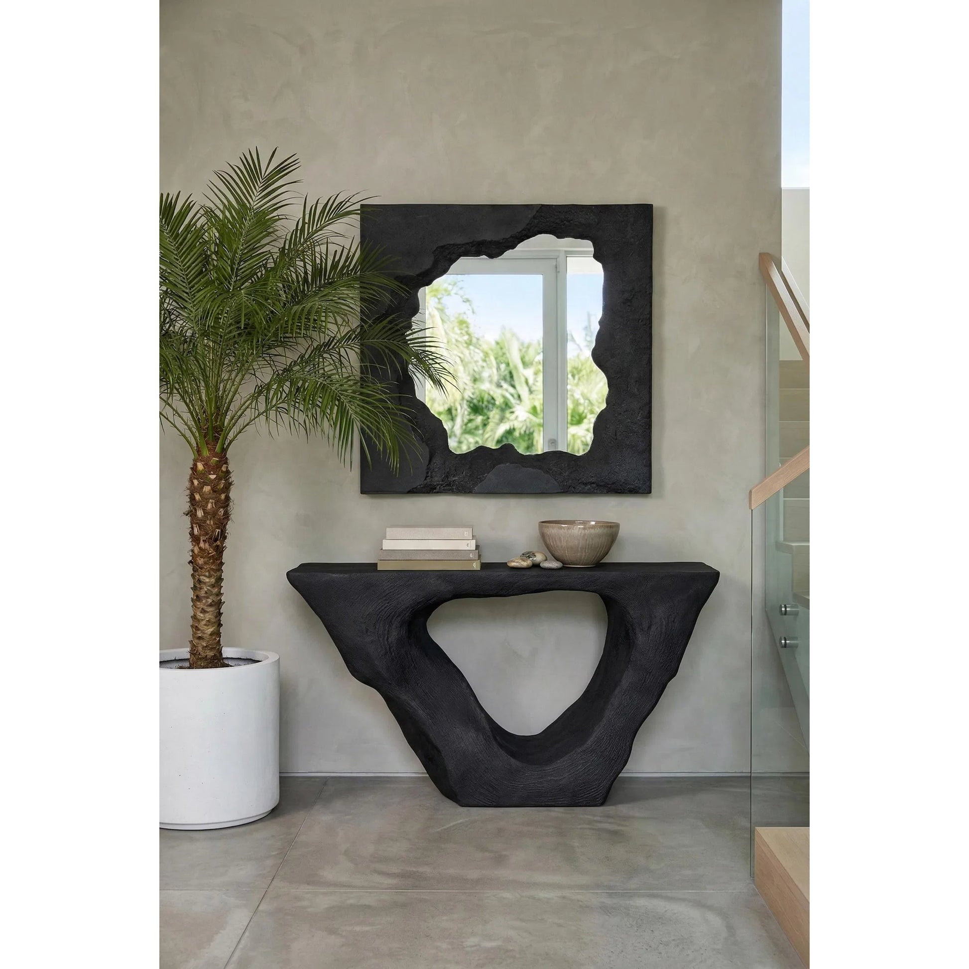 Strata Console by Phillips Collection. Made from resin, stone composite in a unique style.