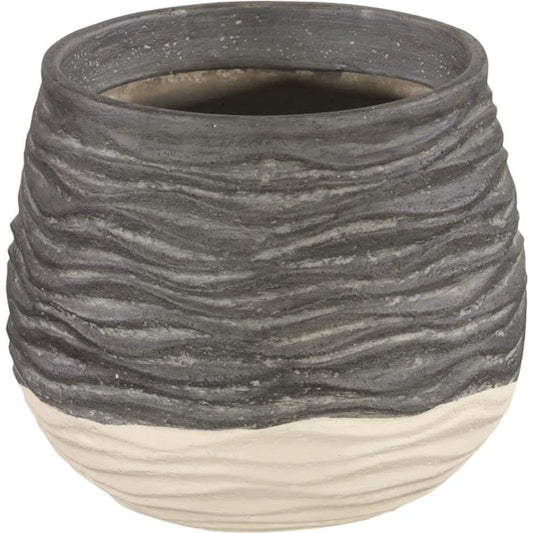 Wavy Vase by Phillips Collection. Made from resin in a unique style.