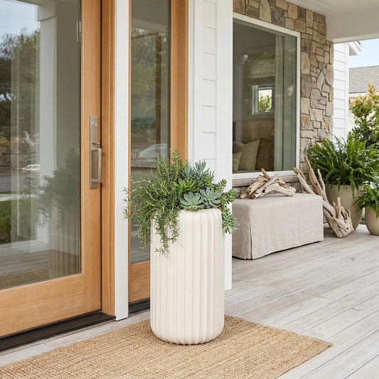Vertical Planter by Phillips Collection in off white and stone cast. Made from resin in a unique style.