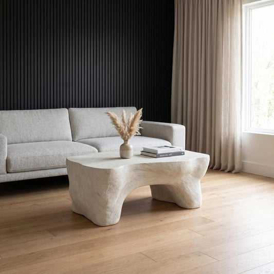 Strata Coffee Table by Phillips Collection in off white and roman stone. Made from resin, stone composite in a unique style.
