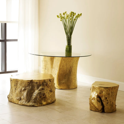 Log Gold Stool by Phillips Collection in gold and gold leaf. Made from resin in a eclectic & global style.