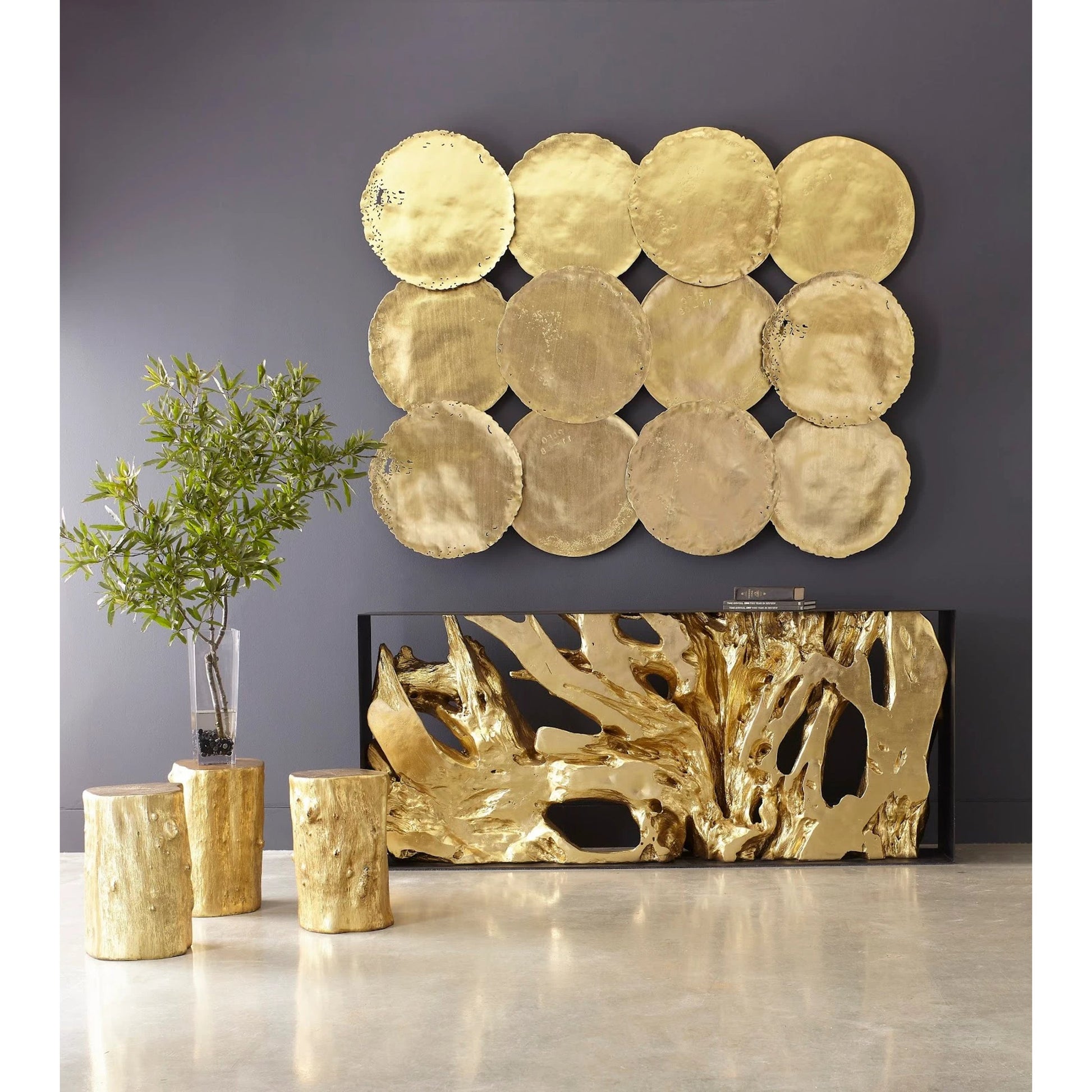 Log Gold Stool by Phillips Collection in gold and gold leaf. Made from resin in a eclectic & global style.