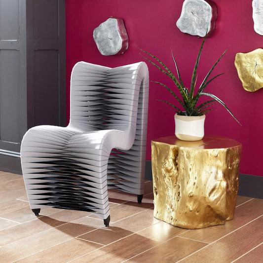 Log Gold Stool by Phillips Collection in gold and gold leaf. Made from resin in a eclectic & global style.