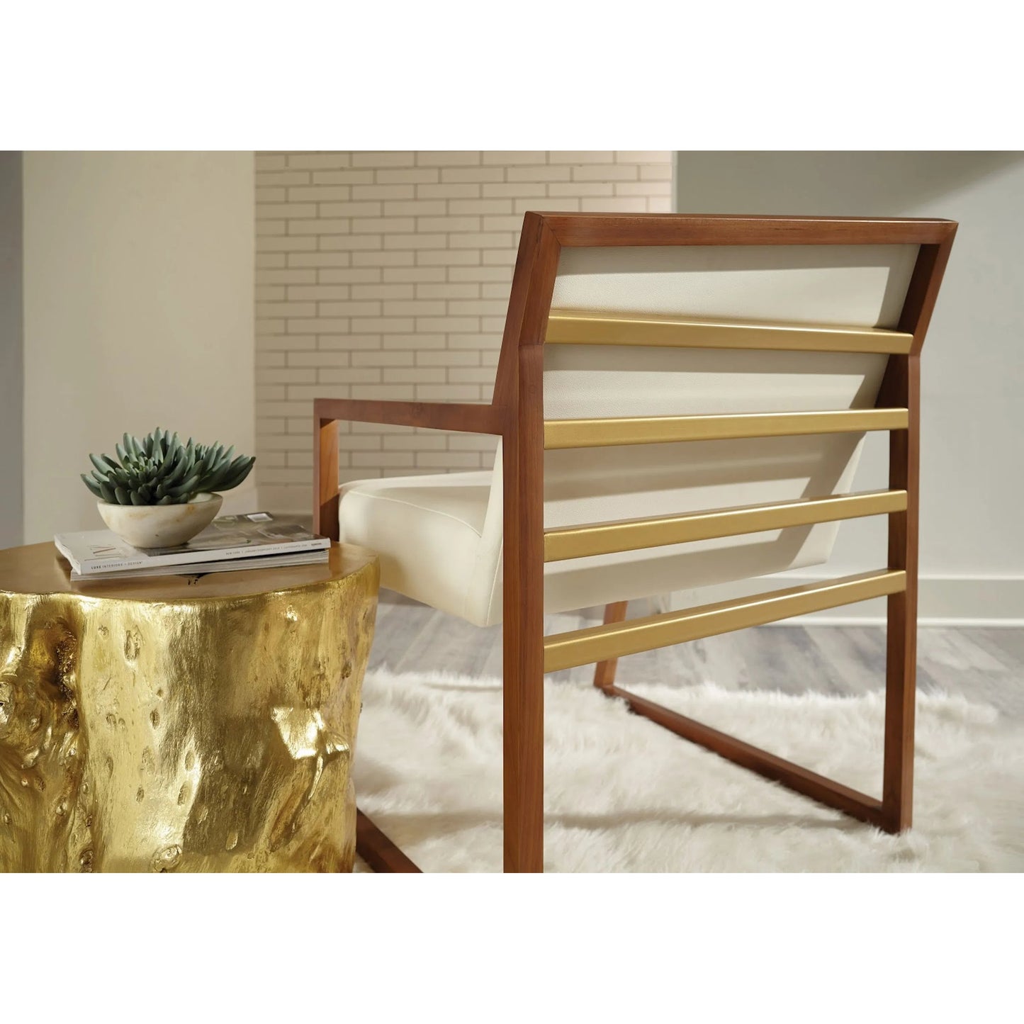 015 SR-820600 | Lifestyle | Log Gold Stool by Phillips Collection in gold and gold leaf. Made from resin in a eclectic & global style.