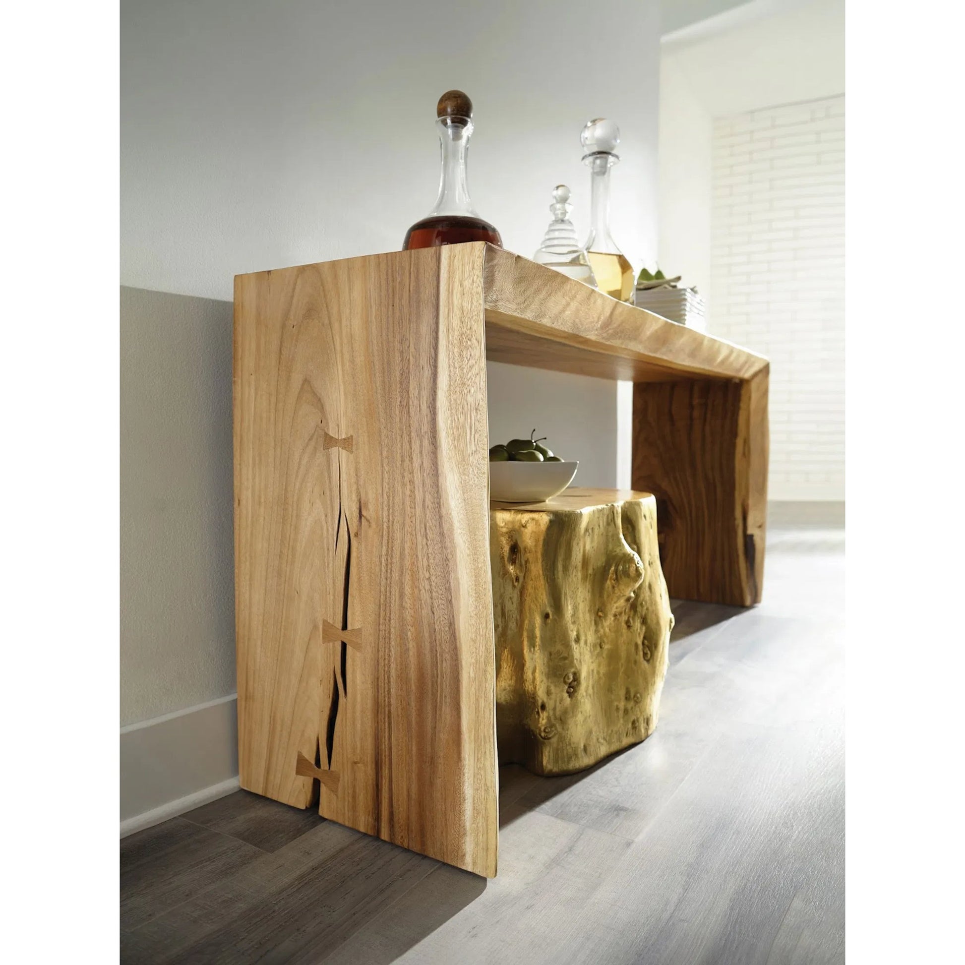 Log Gold Stool by Phillips Collection in gold and gold leaf. Made from resin in a eclectic & global style.