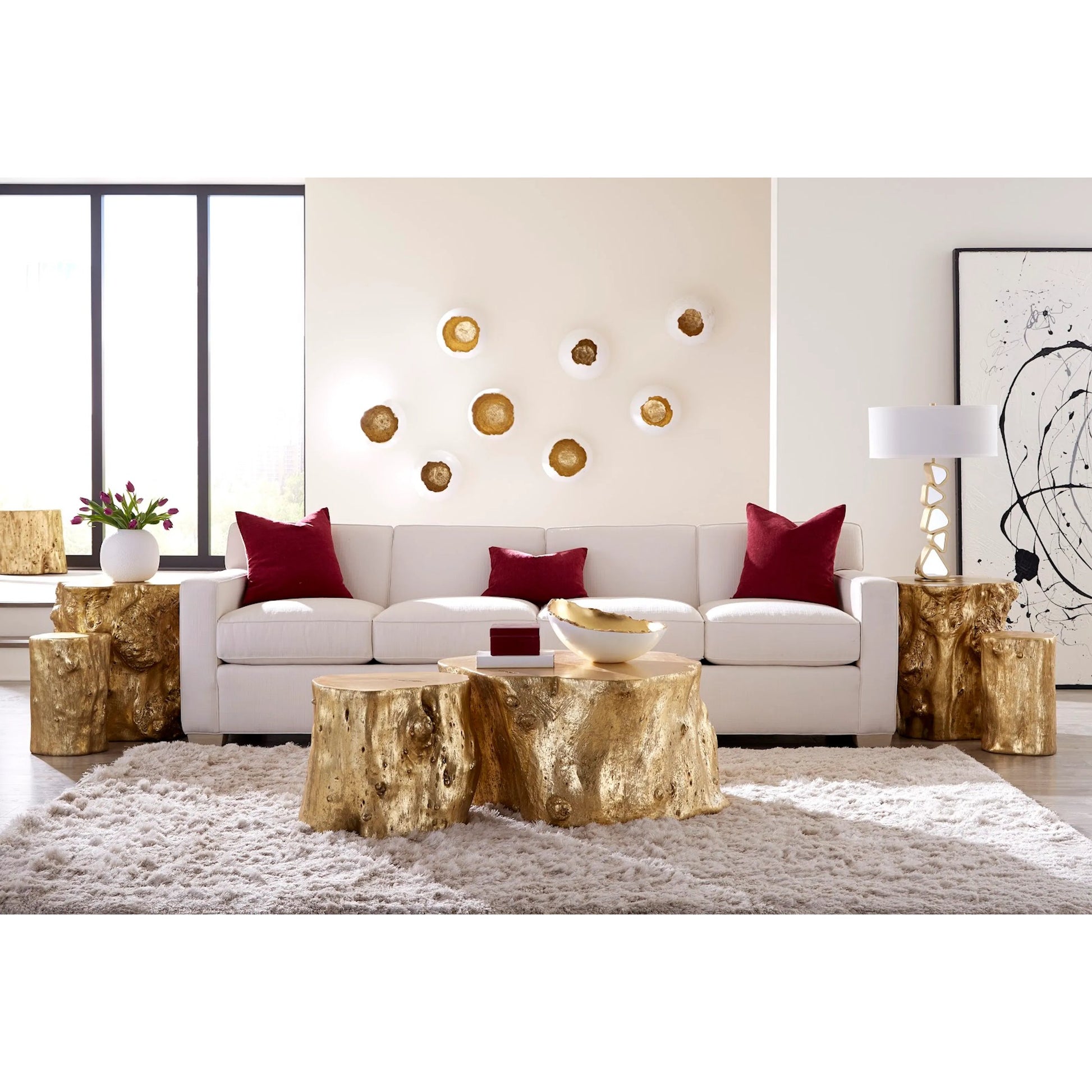 Log Gold Stool by Phillips Collection in gold and gold leaf. Made from resin in a eclectic & global style.
