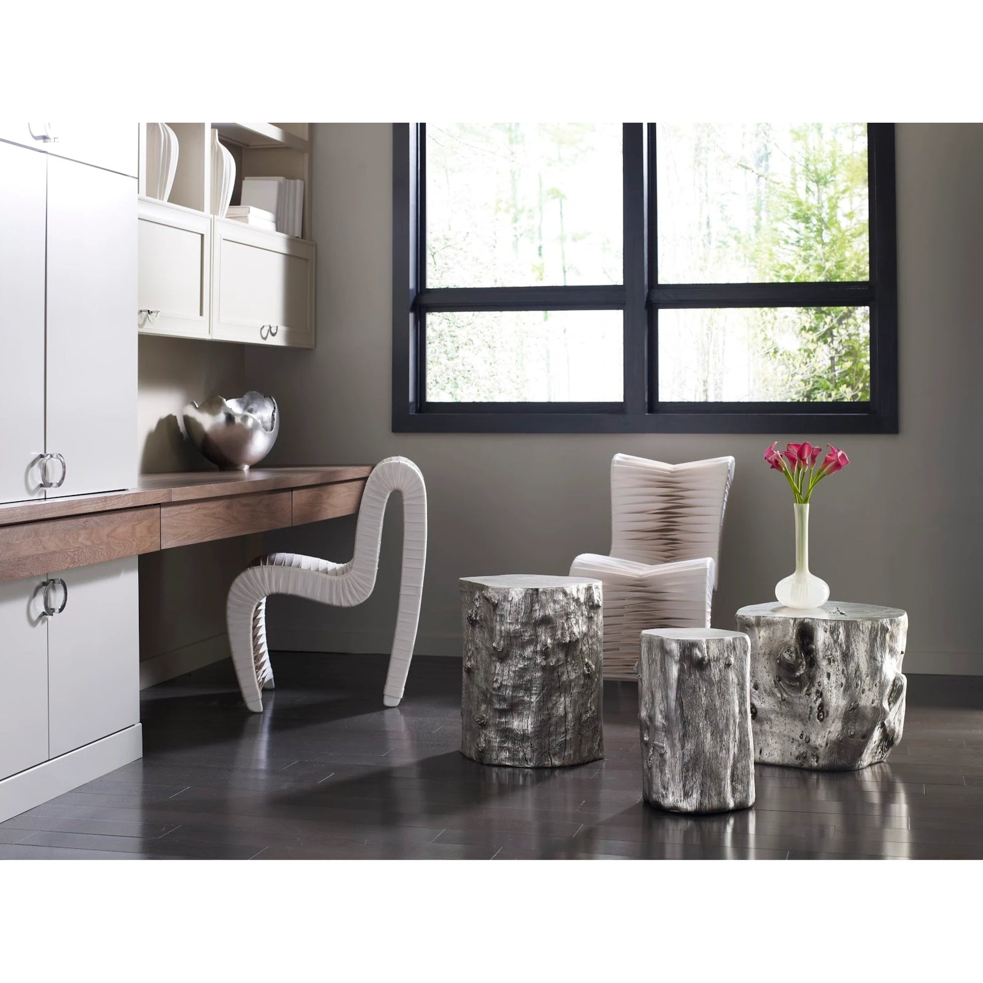 Log Silver Stool by Phillips Collection in silver and silver leaf. Made from resin in a eclectic & global style.