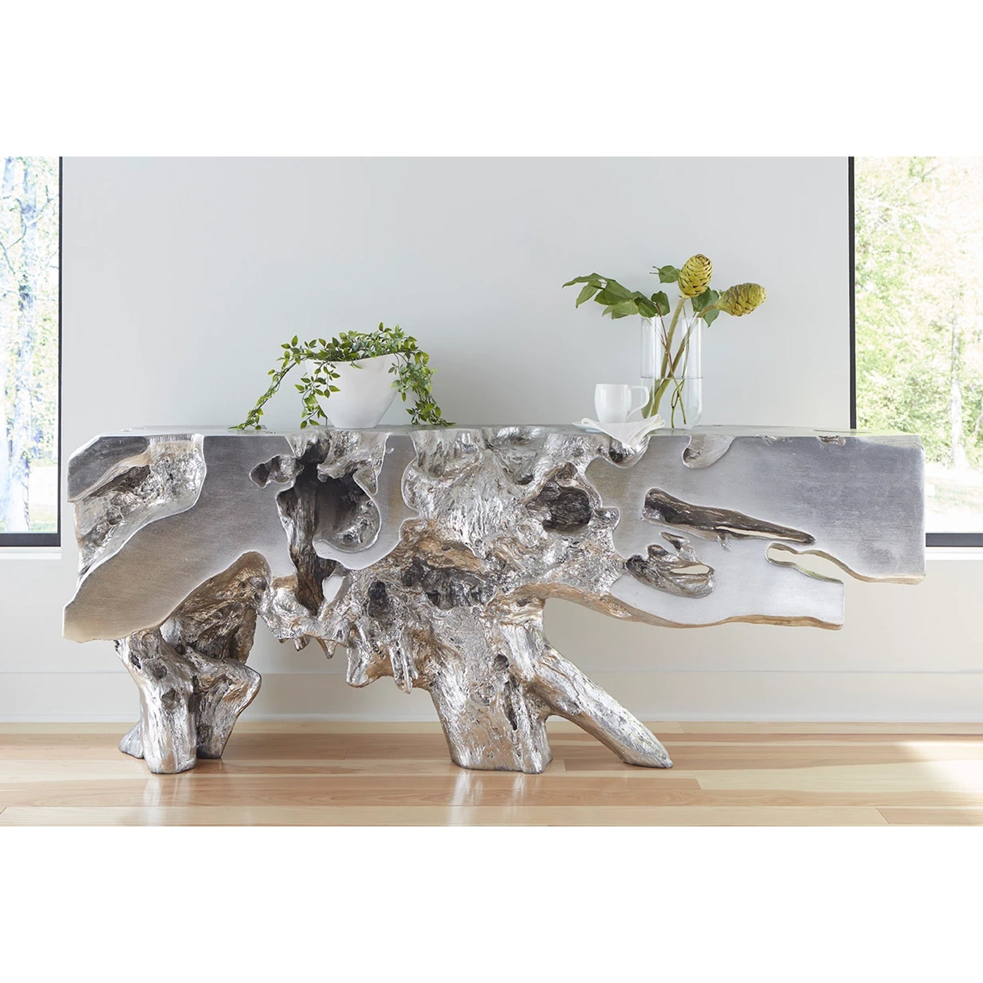 Freeform Console Table by Phillips Collection. Made from unique in a rustic style.