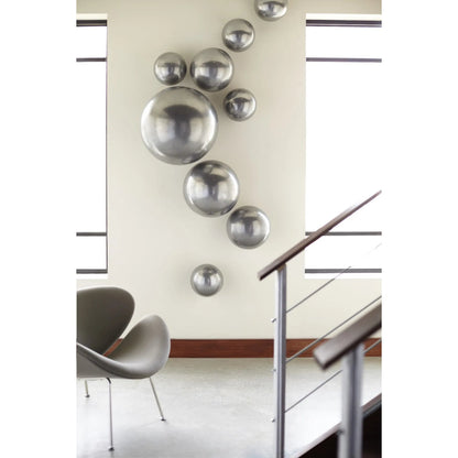 Ball on the Wall by Phillips Collection. Made from resin in a modern style.