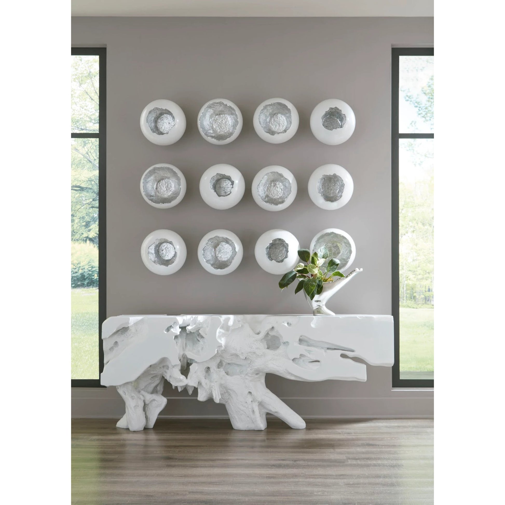 Freeform Console Table by Phillips Collection. Made from unique in a rustic style.