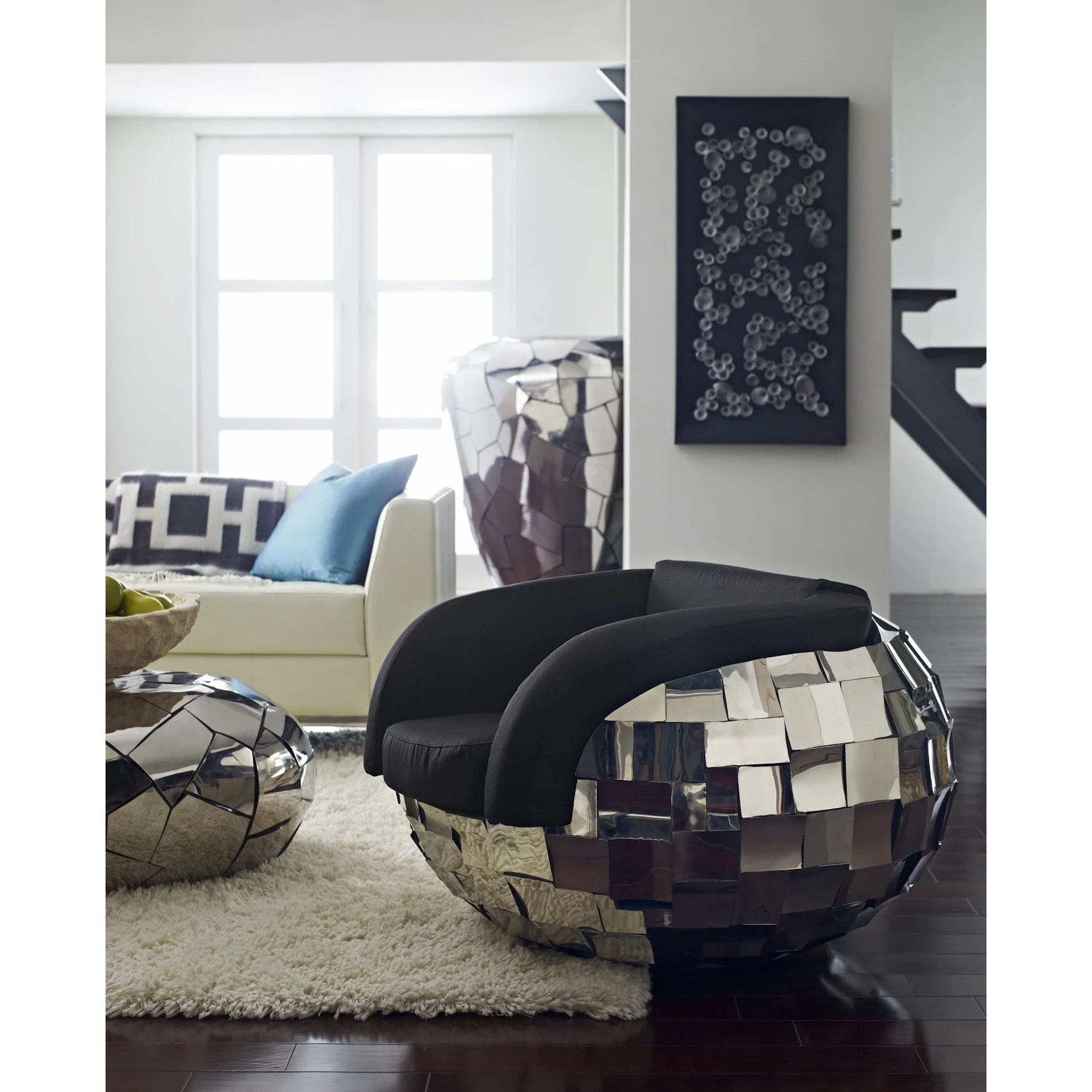 Crazy Cut Club Chair by Phillips Collection in silver. Made from metal in a modern style.